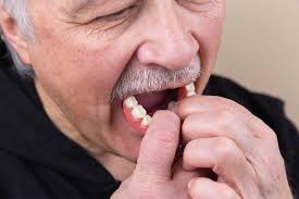 loose dentures and the problems they