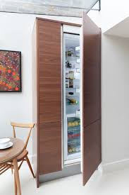 I love how much storage it actually has and that it does not take up any additional space. Hidden Fridge Houzz
