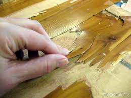 The paint can be stripped off using a commercial paint stripper or your best bet is to sand the paint and cabinets. Difference Between Laminate Wood Veneer How To Paint Both Reality Daydream