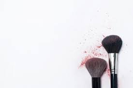 makeup brushes on a white background