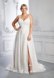 This ball gown wedding dress is perfect for a bride who wants something simple but that still makes a statement. Plus Size Wedding Dresses Julietta Collection Morilee
