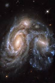 It is considered a grand design spiral galaxy and is classified as sb(s)b. Interacting Galaxy Ngc 6050 Wallpaper Galaxy Ngc Space Telescope Galaxy Collision