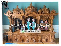 brown swaminarayan teak wood temple for
