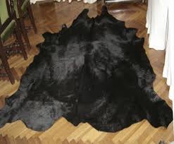 natural d solid black cowhide rug