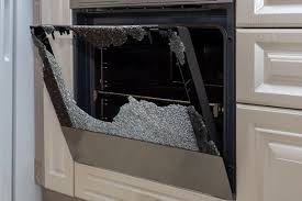 Opened Broken Oven Door In The Kitchen