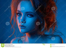 Portrait Of Beautiful Girl In Blue Light Stock Photo Image