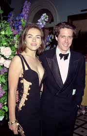 The untold fashion story of elizabeth hurley's iconic versace safety pin dress. The Story Behind Liz Hurley S Black Versace Safety Pin Dress Popsugar Fashion