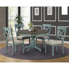 Find your perfect dining table set at our discount prices. The Gray Barn Spring Mount 5 Piece Round Dining Table Set With Cross Back Chairs On Sale Overstock 27175688