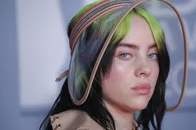 Billie eilish is trading in her baggy pants and hoodies for catsuits and corsets. Billie Eilish Reveals Massive Hip Tattoo In British Vogue Cover Shoot See Photo Allure