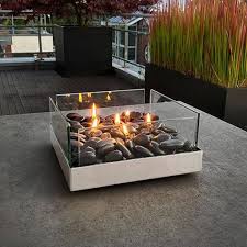Use a terracotta pot to create this inexpensive, warm tabletop fire pit to enjoy your evenings. Garden Party Table Top Fire Pit Fireplace By Oh My Giddy Aunt Notonthehighstreet Com