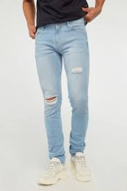 jeans rotos para hombre en varios fits