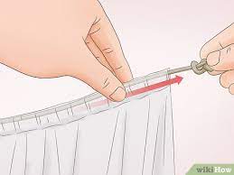 How To Hang Curtains Around A Bed