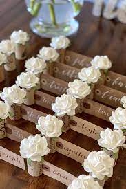 Combine your place cards, wedding favors and a beautiful hanging display by connecting squares of wood to a long ribbon. 310 Your Wedding Place Card Table Ideas In 2021 Place Card Holders Wedding Places Wedding Place Cards