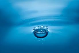 water droplet splashing into water