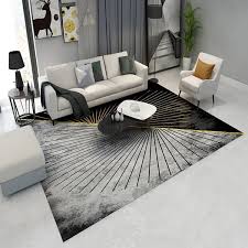 modern abstract gray and gold rug
