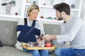 Thoughtful Son Helps Mom When She Is Sick Stock Photo, Picture and Royalty  Free Image. Image 85126648.