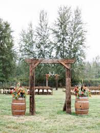 Decorate your yard's wall with some wooden items. Rustic Kelowna Home Wedding Kelowna Real Wedding Mountain Theme Wedding Wedding Themes Rustic Outdoor Wedding Decorations