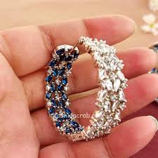 american diamond earrings blue stone