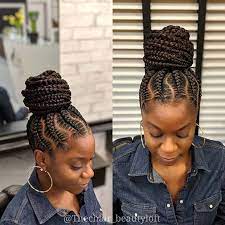 Pull the top half of your hair into a braided bun for a cute relaxed look. Messy Braid Bun Black Hair Novocom Top
