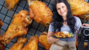 Cooking wings in an air fryer only takes 30 min, and you can toss them in your favorite sauce. Easy Air Fryer Chicken Wings Video Momsdish