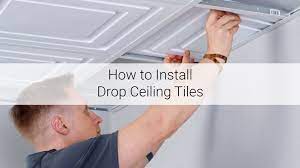 how to install drop ceiling tiles ceilume
