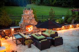 an outdoor fireplace vs fire pit