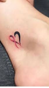 A vibrant pink ribbon set both in front of and. Pin On Tattoos