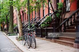 Brownstone Row Houses And Sidewalk In West Village New York City Usa  High-Res Stock Photo - Getty Images