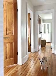 wood stained doors with white trim