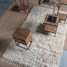 remove furniture dents from rugs
