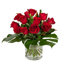 Red Roses In A Glass Vase