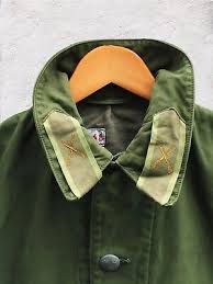 Basement by pole near the boots end of isle by mickey mouse. Green Vintage Swedish M59 60s Olive Chore Worker Work Mod Military Jacket