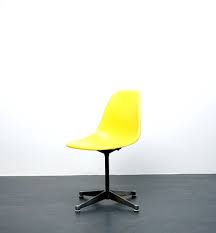 vintage yellow shell chair in