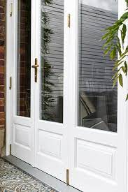 Timber Bifold Doors With Stained Glass