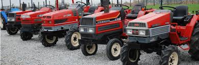 Compact Tractors And Attachments For
