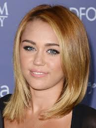The dark brown hair color will give the perfect look for. Miley Cyrus Shoulder Length Blonde Hair Daedalusdrones Com