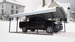 Tan car garage shelter built for the outdoors and all seasons; Wind And Snow Rated Winter Storage Shelters