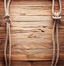 brown wood plank with manila ropes
