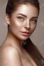 Beautiful Young Girl With Natural Nude Make-up. Beauty Face. Photo Taken In  Studio Stock Photo, Picture and Royalty Free Image. Image 98698537.