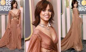 Golden Globes 2023: Jenna Ortega sizzles in a Grecian inspired tan Gucci  gown with cut-outs | Daily Mail Online