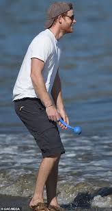 'we all know what the british. Prince Harry Flips His Baseball Cap Backwards For Seaside Stroll With Dog In La Daily Mail Online