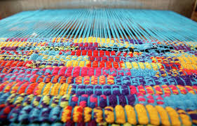fargo woman weaves upcycled rugs