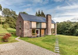 Sandstone Clad House In Wales Resembles