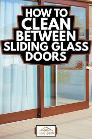 to clean between sliding glass doors