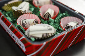 Fold the bills into a box style and roll one bill into the diploma style and tie a cute twine. 5 Fun Ways To Gift Wrap Money Hgtv