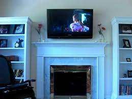 plasma tv mounted over fireplace you