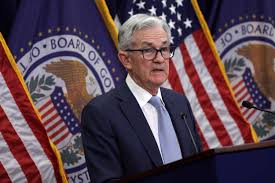 fed chair powell says more rate