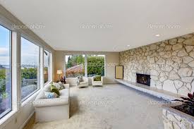 Bright Living Room With Rock Wall Trim