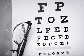 Poor Eyesight Cracked Glasses Against The Background Of The