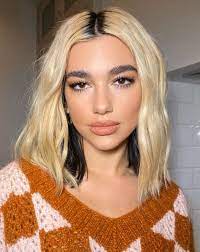 The new rules singer was spotted strolling through east village in new york city sporting a choppy new mullet with a bleached fringe and crown section. Dua Lipa Blonde Hair Color Dua Beauty Hair Color